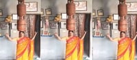 తలపై రెండు గ్యాస్ సిలిండర్లు పెట్టుకొని.. ఆ మహిళ ఏం చేస్తుందో చూడండి?